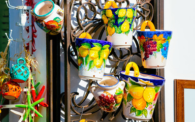 Colorful traditional ceramics vases Positano store reflex