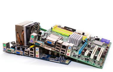 two motherboards for computer technology. one board with a cooling cooler.