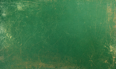 Abstract grunge jade green background with golden patina