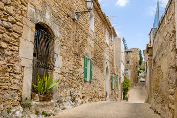Fototapeta premium Palma de Mallorca, Mallorca, May, 13, 2015. Old street between one-story stone houses
