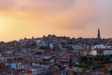 Fototapeta na wymiar City of Porto in Portugal in a vivid yellow sunset