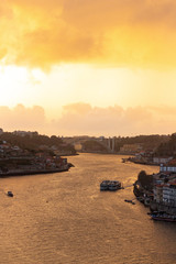 Obraz premium City of Porto in Portugal in a vivid yellow sunset