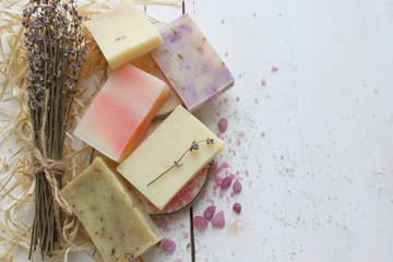 Colorful handmade soap concept. Natural handmade soap on a wooden background.Handmade natural eco soap, selective focus. Copy of the space, top view, background mode. Healthy skin. Wash their hands.