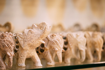 Goa, India. Elephant Souvenir Of Stone On Shelf In Store. Goods For Tourists