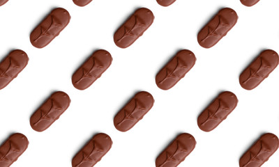 Seamless pattern of chocolate bars on white background. Food texture