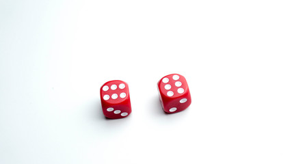 Two dice with one and two count against white background