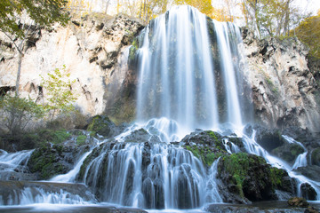 cascading beautiful waterfall in the mountains