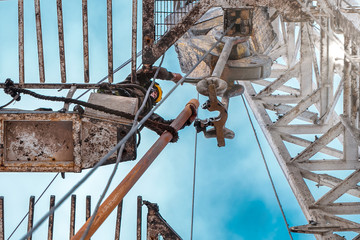 Offshore oil rig worker prepare tool and equipment for perforation oil and gas well at wellhead...