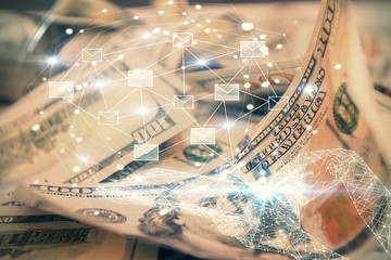 Double exposure of E-mail envelop drawing over usa dollars bill background. Concept of connection.