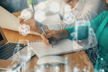 Double exposure of technology theme drawing over people taking notes background. Concept of Tech