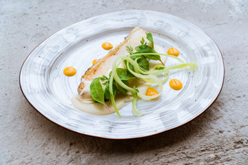 Cod fish with herbs and sauce