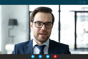 Headshot portrait screen application view of young businessman have online web conference with...