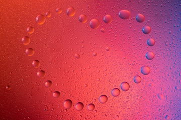 heart Love symbol in neon light background drops trend 2020 color Aqua menthe classic blue Lush lava, Flat lay top view copy space