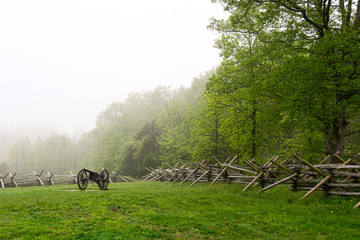 Canon in field on foggy morning, Gettysburg, Pennsylvania.