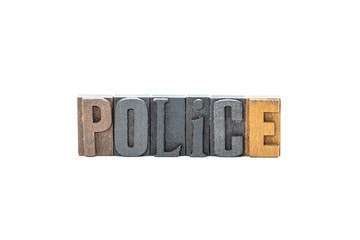 Police in wood block letters