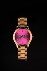 Beautiful women's gold watch with a pink case inside