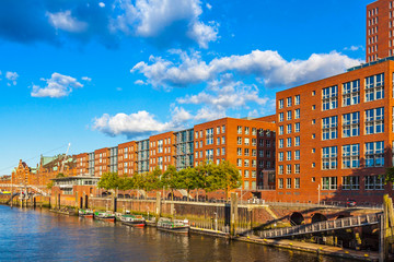 Fototapeta na wymiar Panoramic view of City of Warehouses disctrict (German: Speicherstadt) in Hamburg city, Germany. The largest warehouse district in the world. UNESCO World Heritage Site since 2015
