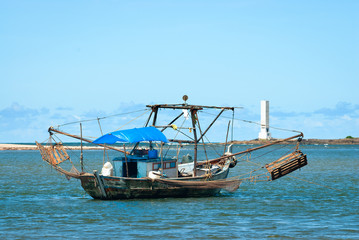 Obraz premium Itacare beach, Bahia, Brazil on February 23, 2008. Colorful fishing boat on Contas river