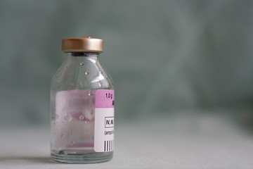 Empty vial of  antibiotics, injection drugs used in treatment of  patients with pneumonia caused by...
