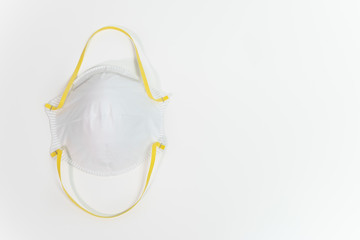 Face mask or respirator with N95 level protection. Copy space on right.