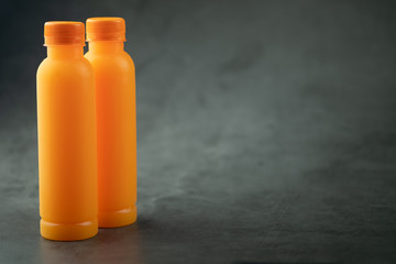 Orange juice in plastic bottles