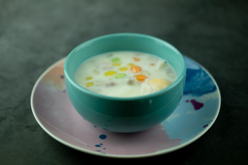 Thai sweets and colorful ball flour in blue bowl