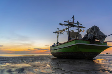 Obraz premium Fishing vessel with sea ocean in sunrise time.