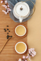Fototapeta na wymiar Tea and flowers on the table