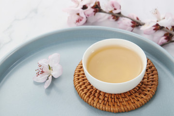 Tea and flowers on the table