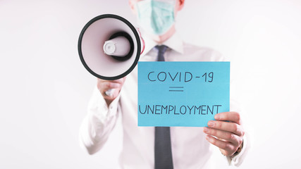 Covid-19 outbreak and fear of unemployment. businessman with loudspeaker