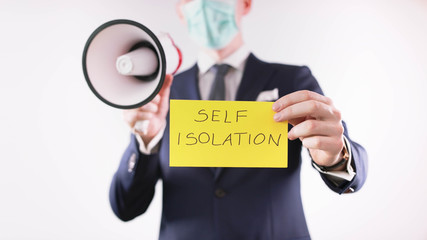 Self isolation, Man announcing prevention measures against the covid-19 spread.
