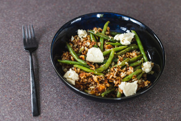 healthy plant-based food, crumbed hash brown with green beans and homemade vegan mozzarella made of cashews