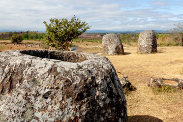 The Plain of Jars is Ancient stone a megalithic archaeological landscape in Xieng Khouang Province,...