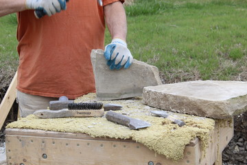 Measuring limestone for a wall
