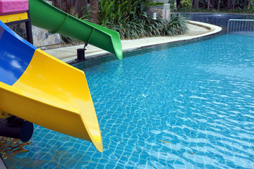 Plastic slider in front of swimming pool.