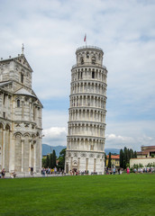 A shot of Leaning tower of Pisa with tourists