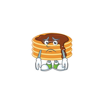 Cartoon picture of chocolate cream pancake with worried face