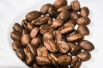 Freshly roasted coffee on the plate