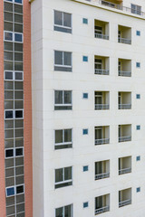 Apartment building exterior architecture with windows and balconies 