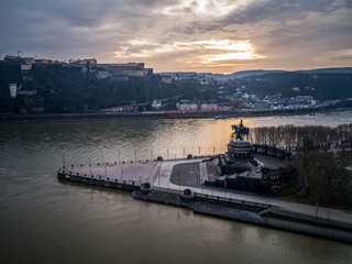 Colorful Sunrise burning sky Koblenz City historic monument German Corner where river rhine and...
