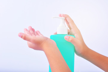 Man wash their hands with alcohol gel to prevent the spread of infections corona virus along with avoiding bacteria. Isolation on white background with clipping path.