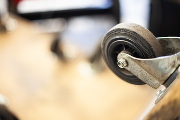 caster wheel close up in garage