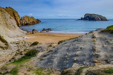 Amazing coast with incredible cliffs near the village of Liencres. Cantabria. Northern coast of Spain