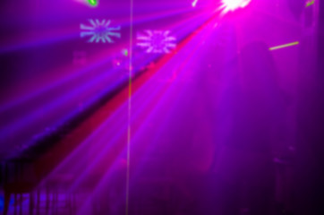 Abstract blur Light And Silhouette in club party is blurred for background