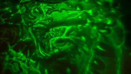 Obraz na płótnie Canvas Marble reflective green and black background