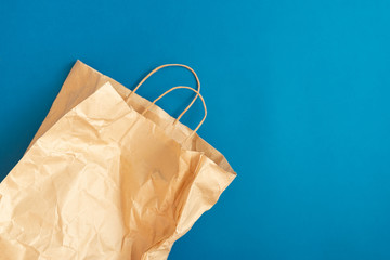 Crumpled Paper bag on a blue background