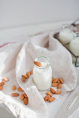 Homemade almond milk in a small bottle