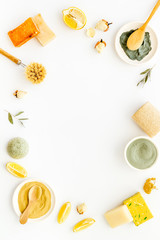 Mud mask - facial cosmetis flat lay - on white background top view copy space