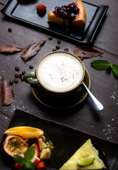 Hot cappuccino on a wooden table