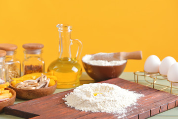 Ingredients for tasty pizza on table